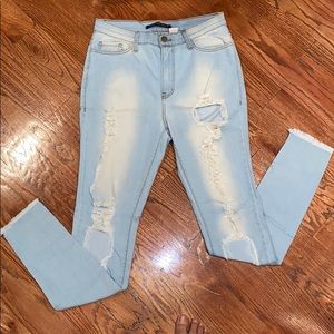 Fashion Nova Distressed Light Wash Skinny Jeans